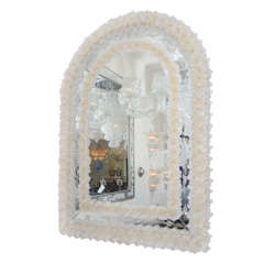 Lunette shaped Venetian mirror with gold glass flower surround