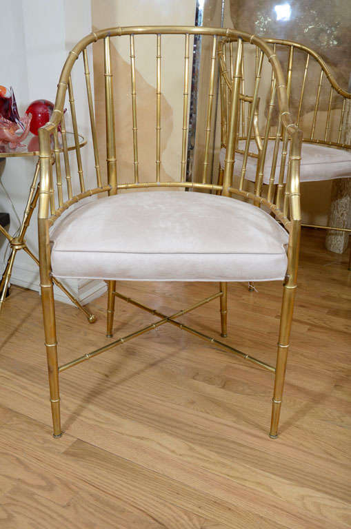 Italian Pair of upholstered brass faux bamboo arm chairs