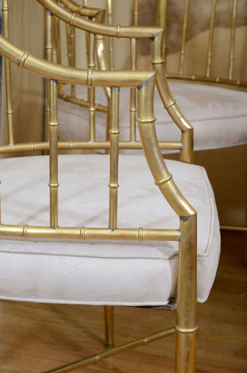 Pair of upholstered brass faux bamboo arm chairs 1