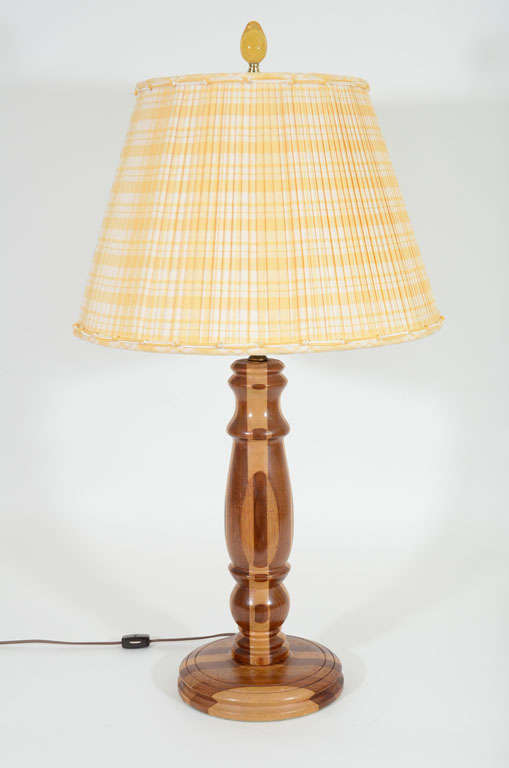 Folk Art Treenware Table Lamp with Yellow Pleated Silk Shade. Faux Amber Finial, American, Late 19th / Early 20th Century<br />
<br />
26 inches high x 7