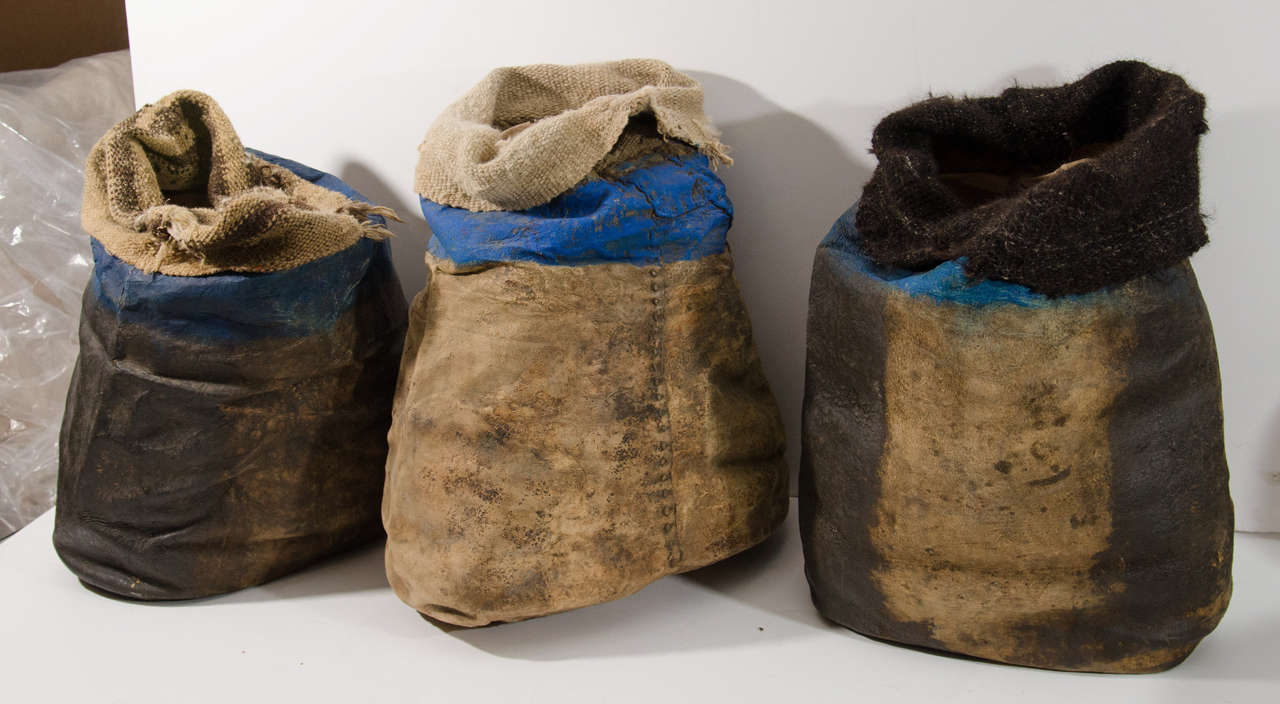 Leather and Burlap Peruvian Grain Sacks, painted with blue stripe.