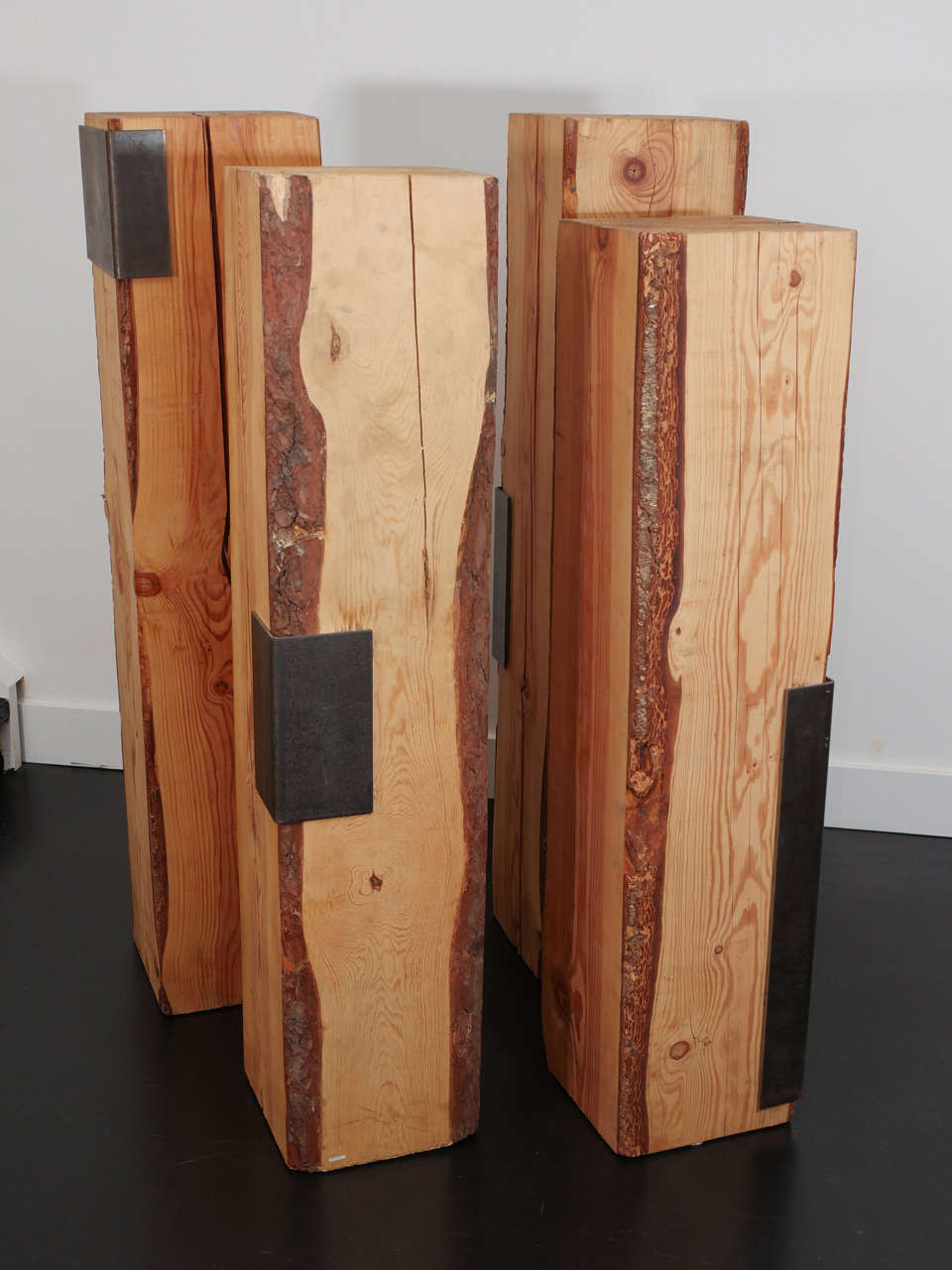 Sculptural pedestals by design duo Garouste and Bonetti, produced by Cat Berro. Raw pine with iron details. The pedestals were used to display silver pieces by Franco-Russian object designer Goudji in Orleans. Very strong presence and art pieces on