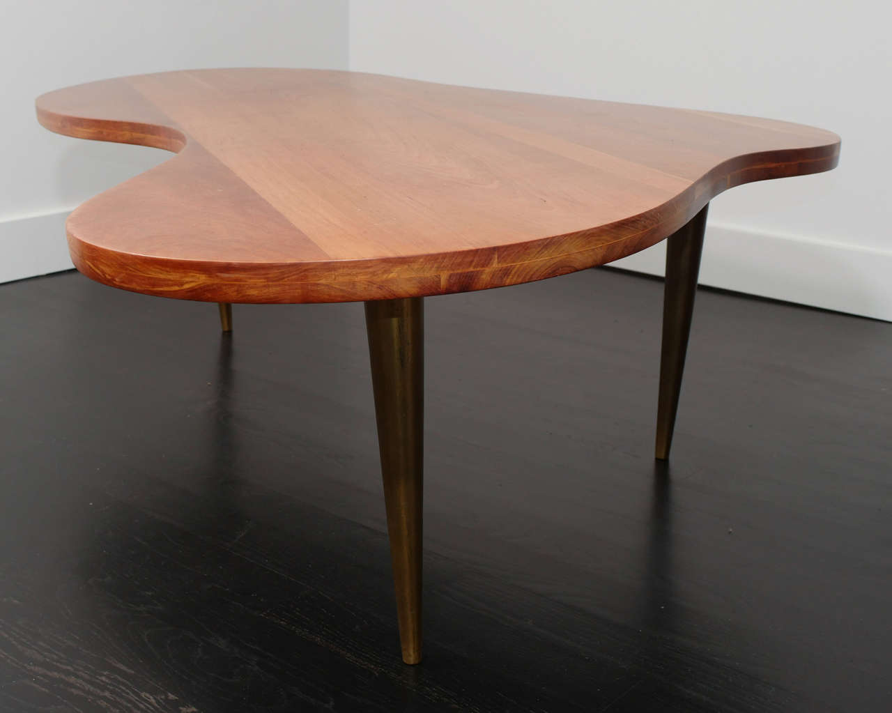Large and stunning coffee table with brass legs by Gibbings for Widdicomb. Stamped.