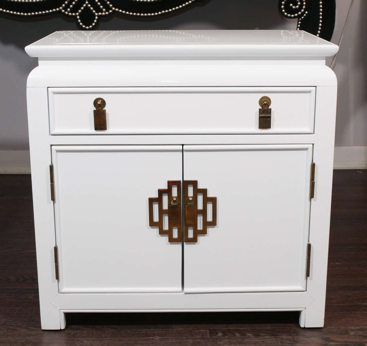 Pair of 1970s white lacquer end tables with brass hardware.