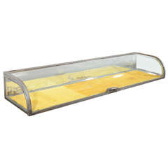 A Long Steel, Mirrored and Glass Display Case.