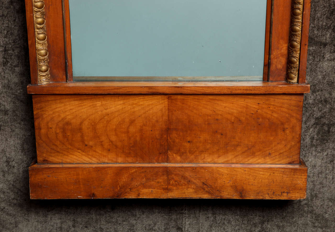 A 19th Century German Neoclassic Cherrywood Mirror In Excellent Condition In New York, NY