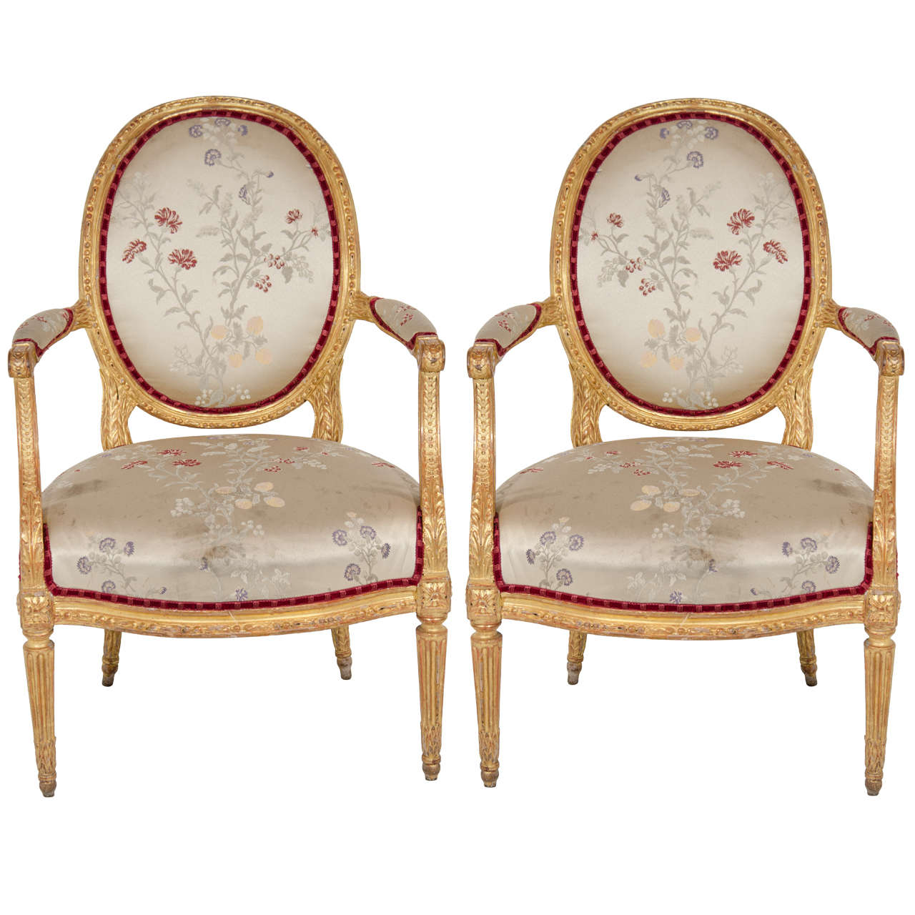 Pair of Antique French Louis XVI Carved Giltwood Armchairs