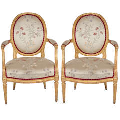 Pair of Antique French Louis XVI Carved Giltwood Armchairs