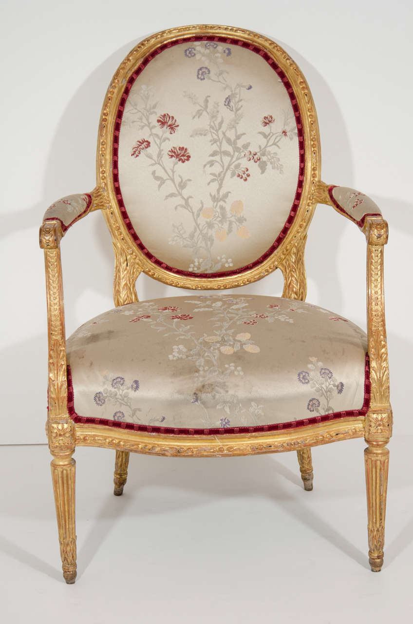 Hand-Carved Pair of Antique French Louis XVI Carved Giltwood Armchairs