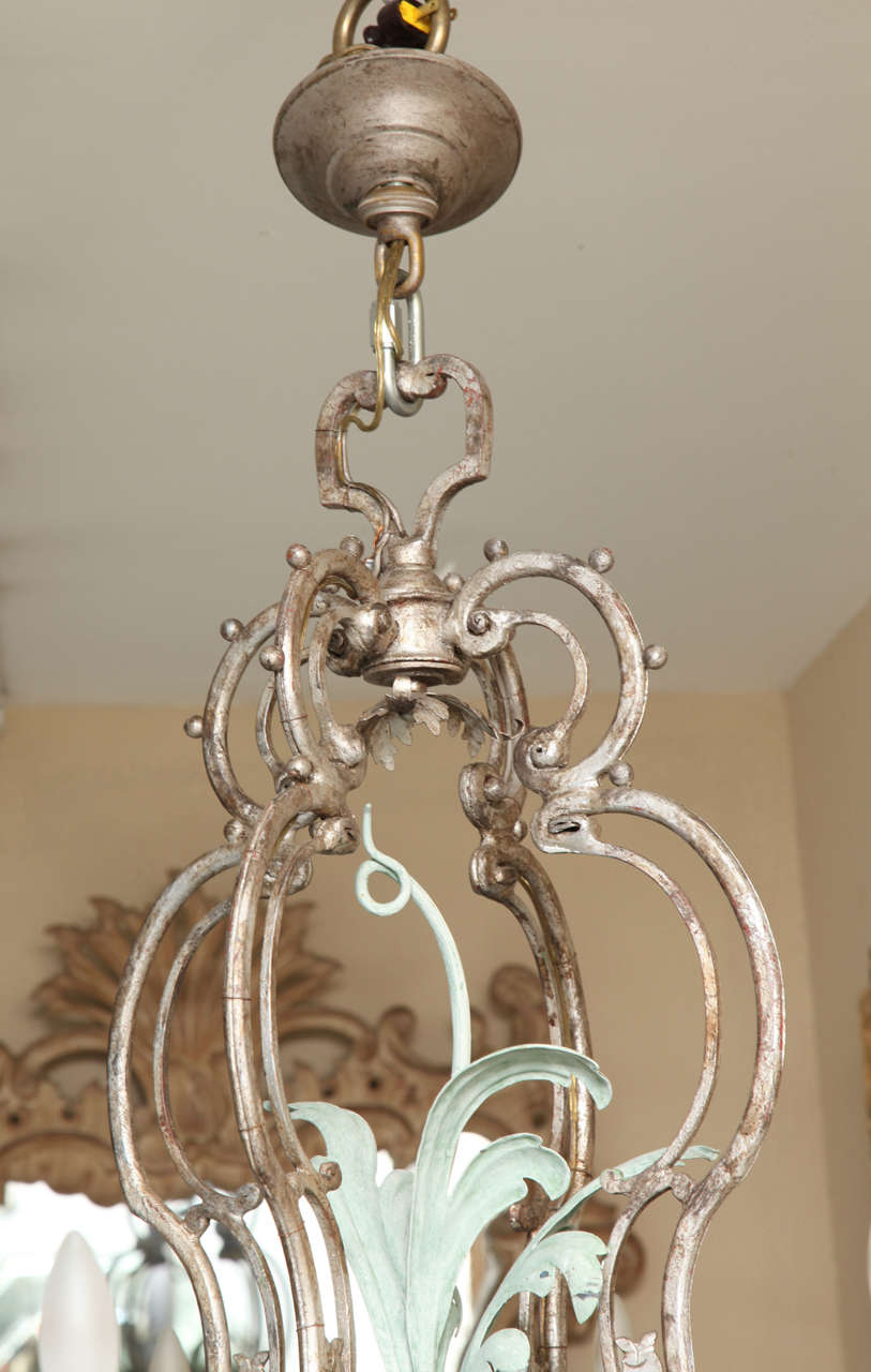 American A Twelve-Light Palmette Silvered Metal Chandelier Attributed to  E.F Caldwell