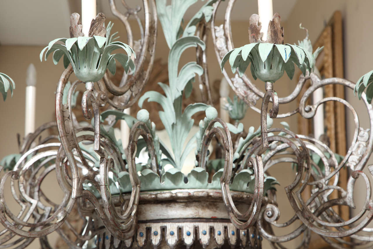 A Twelve-Light Palmette Silvered Metal Chandelier Attributed to  E.F Caldwell 1