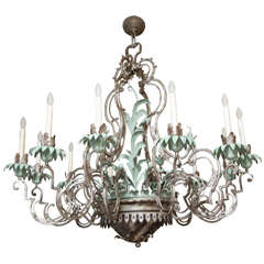 A Twelve-Light Palmette Silvered Metal Chandelier Attributed to  E.F Caldwell