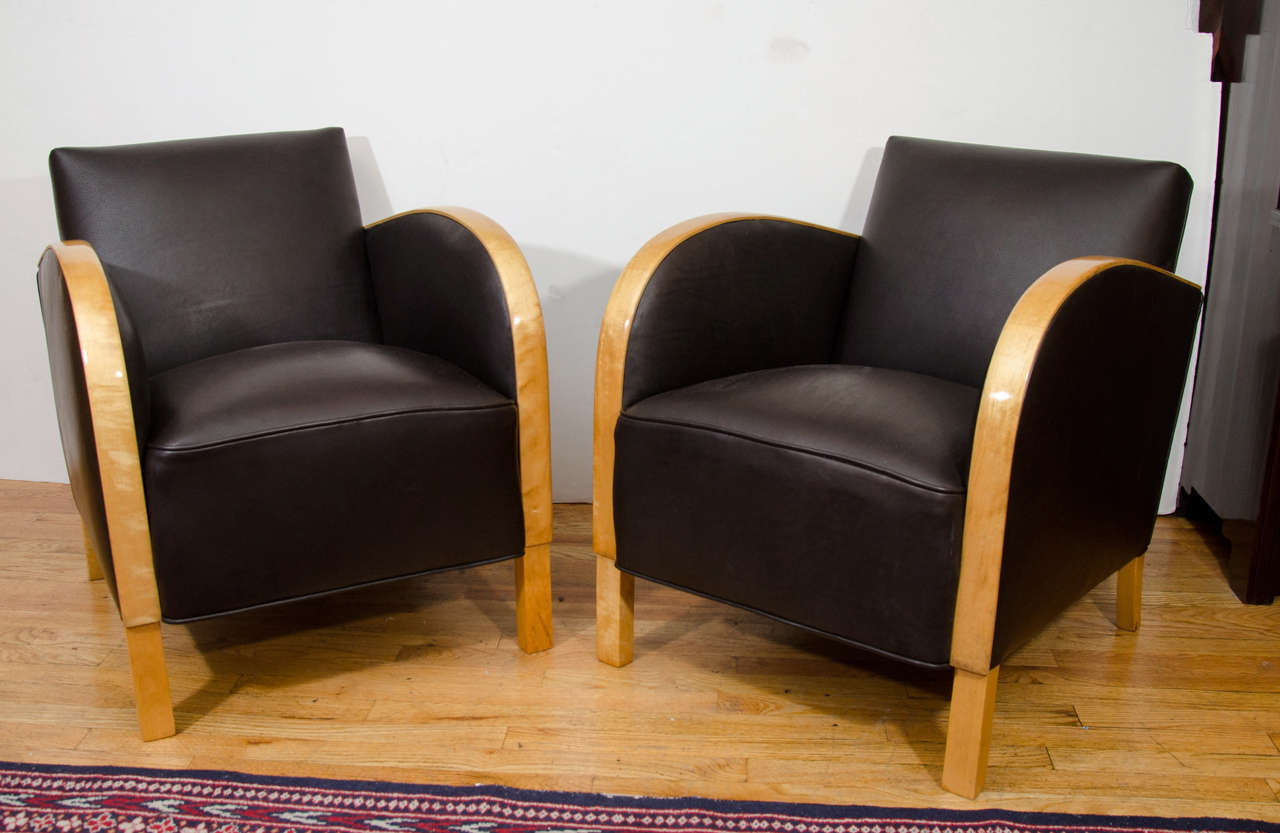Classic Swedish Funkis design, marrying geometry with function, these chairs were first used aboard the Swedish American cruise ships, and soon found their way into private homes of the well travelled. These roomy, comfortable chairs accommodate the