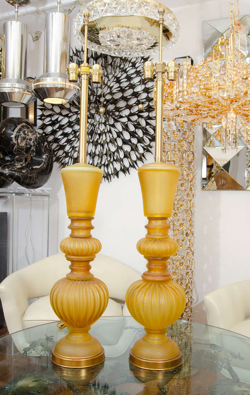 Pair of translucent gold glass table lamps with crackle finish surface texture by Seguso.

View our complete collection at www.johnsalibello.com