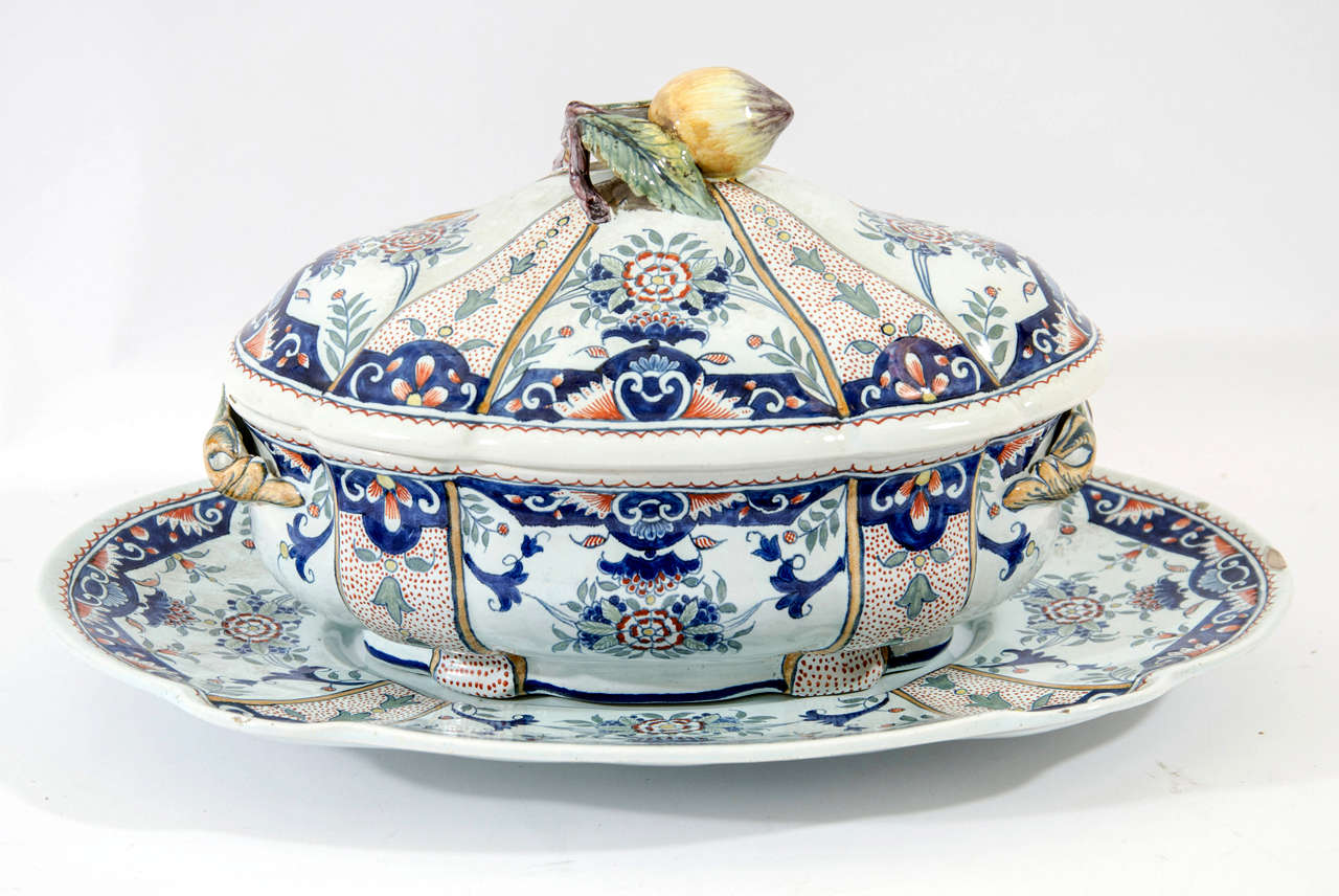 Faience Polychrome Lidded Soup Tureen and Platter in Blue, Green, and Yellow Tones on White Ground.  Rouen, France.  Late 19th Century

17 inches wide x 11 inches deep x 9 inches high
