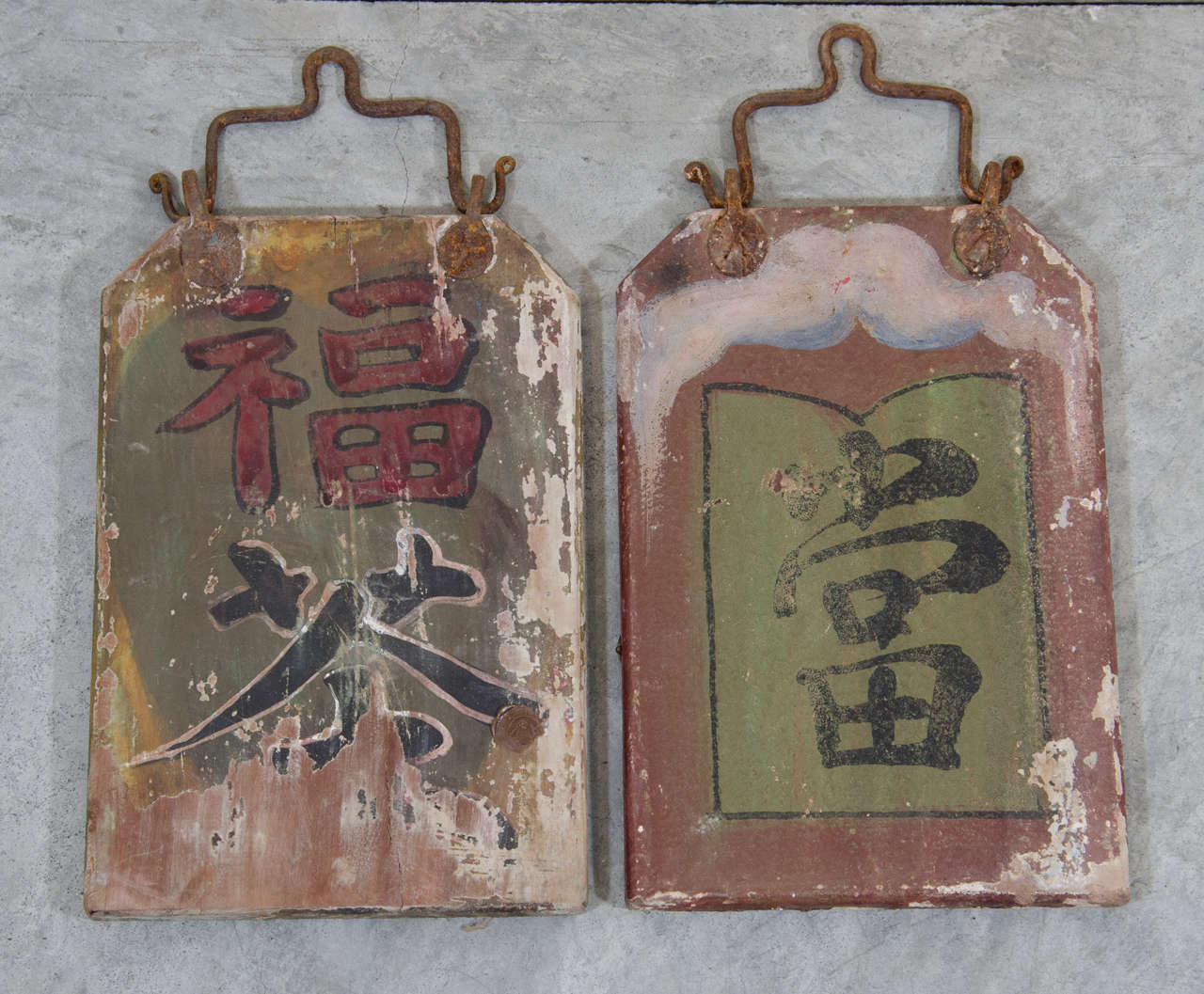 A pair of double-sided antique Chinese shop signs with original hardware. These signs were from a tea shop and a pawn shop.  From Shanxi Province, c. 1800.
BD371