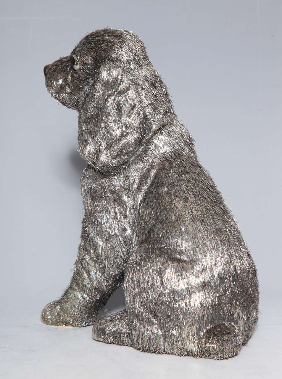 A rare Seated Silver Haired Spaniel Dog Statue by M. Buccellati In Excellent Condition In New York, NY