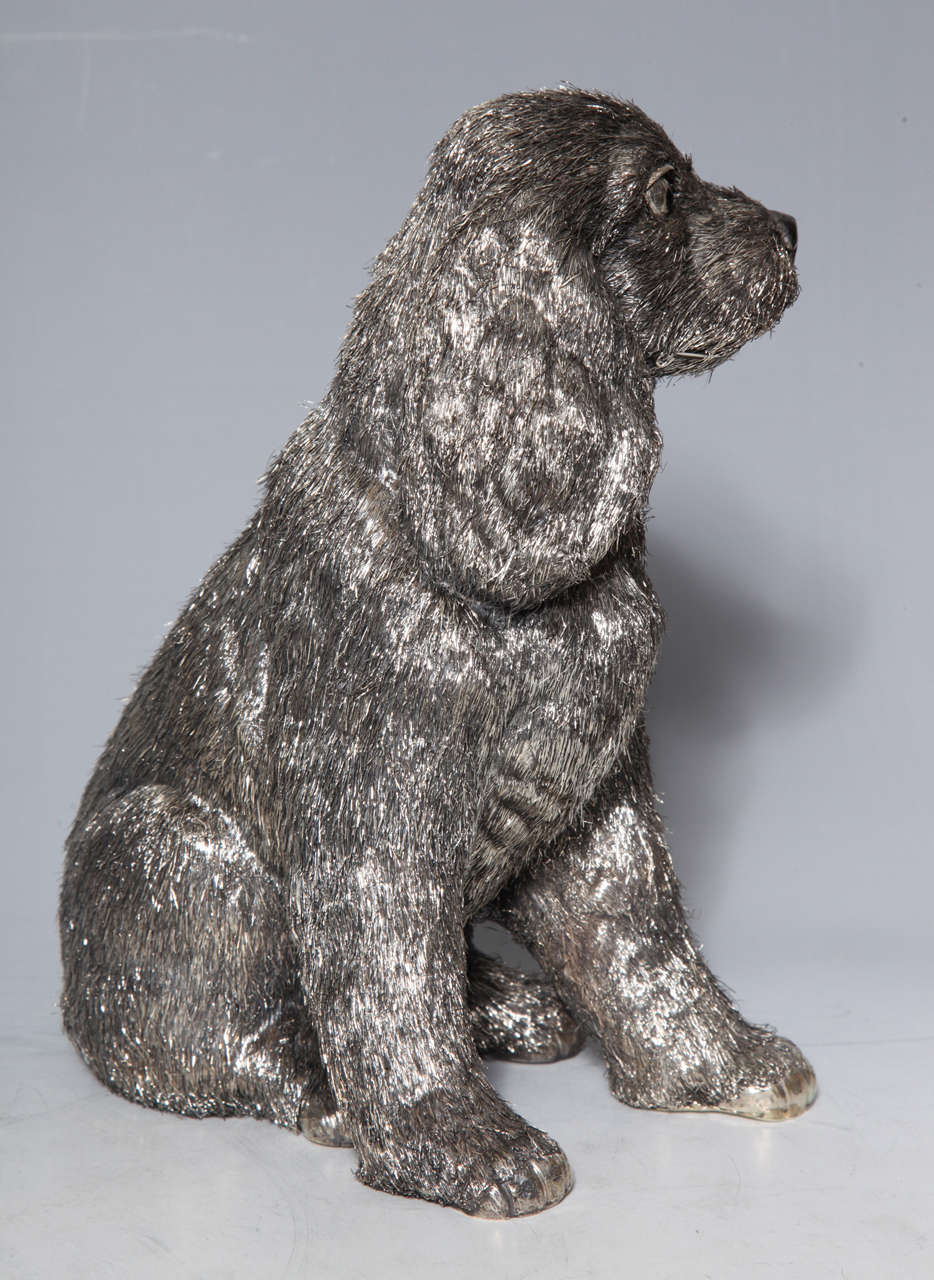 A rare Seated Silver Haired Spaniel Dog Statue by M. Buccellati 1