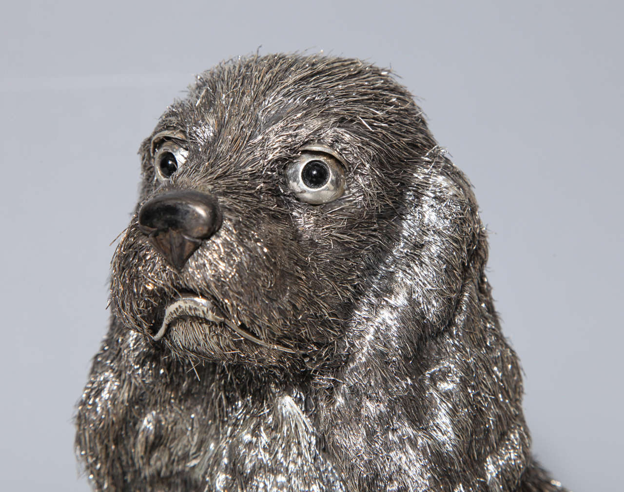 A rare Seated Silver Haired Spaniel Dog Statue by M. Buccellati 2
