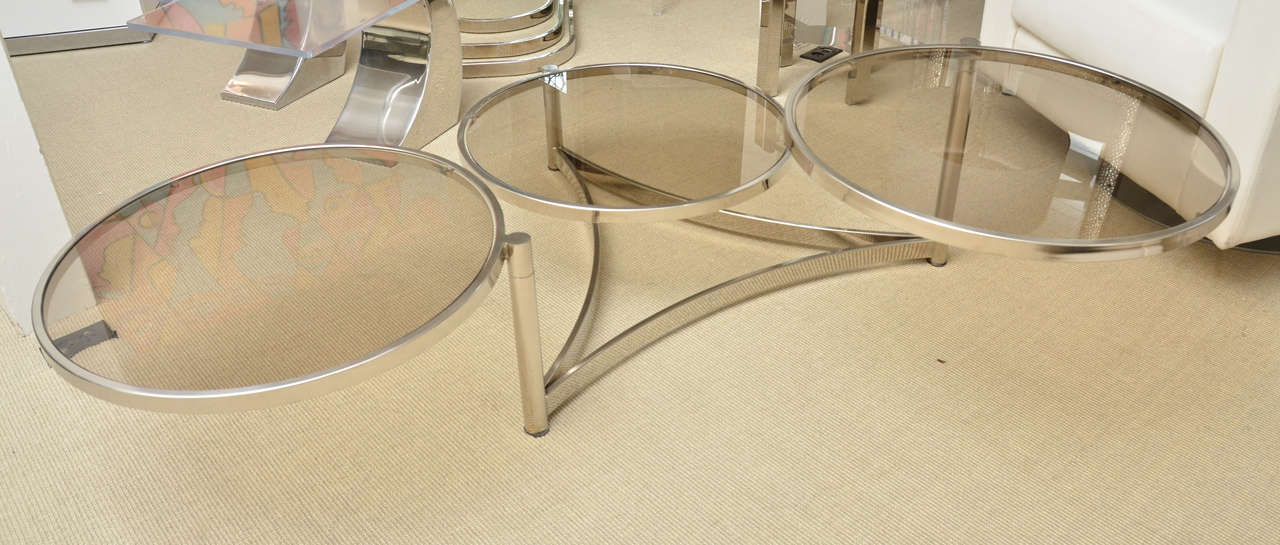Fabulous 3-circle mechanical cocktail table. All 3-circle tops articulate.