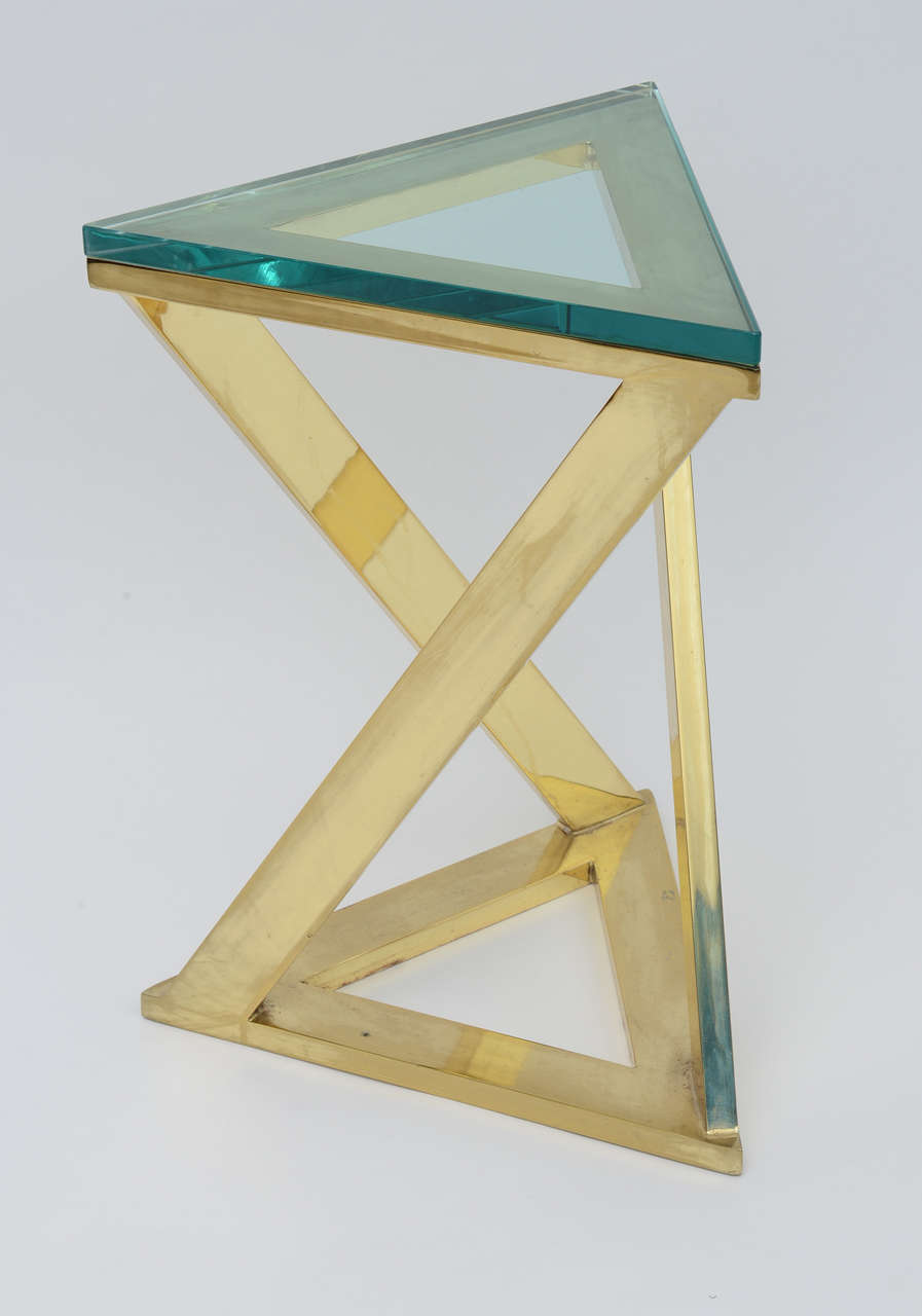 the triangular top above 3 supports on a triangular base with original glass