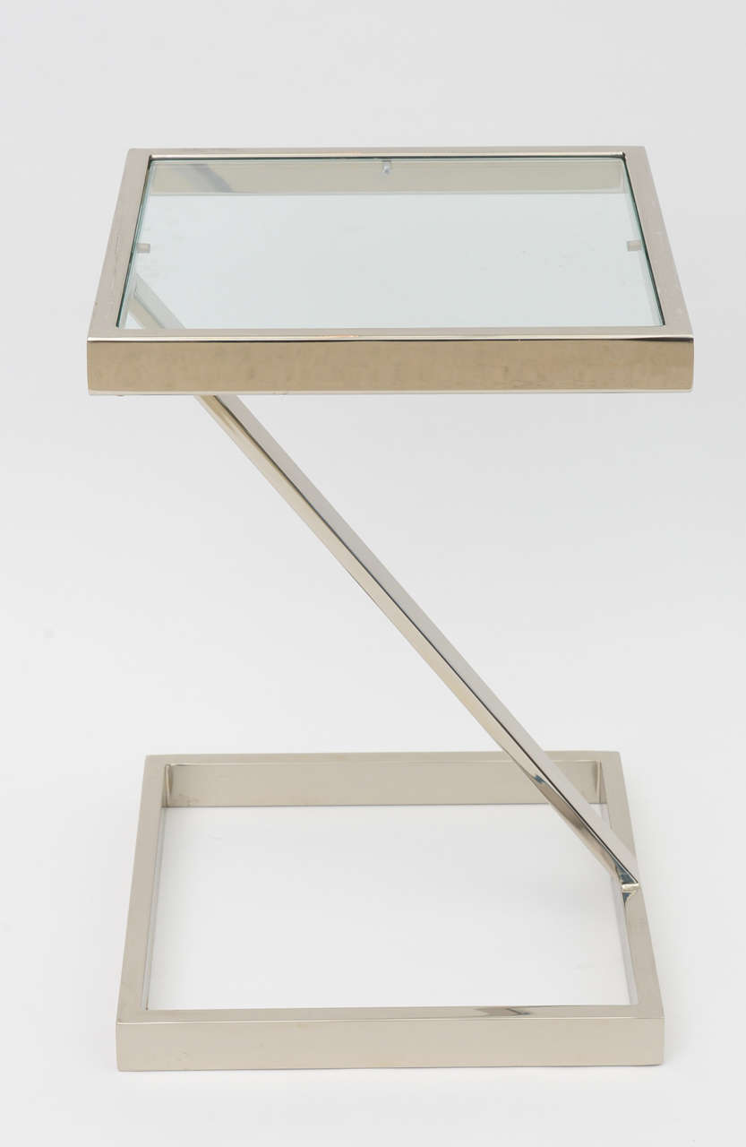 The inset glass top within a chrome framework.