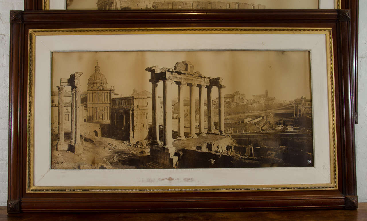 Attributed to Tommaso Cuccioni (1790-1864, Italy), a large scale albumen print of the Forum on three sheets joined. The photograph mounted within a large stained oak carved and gilt Aesthetic Movement frame with carved rosettes on the corners. The