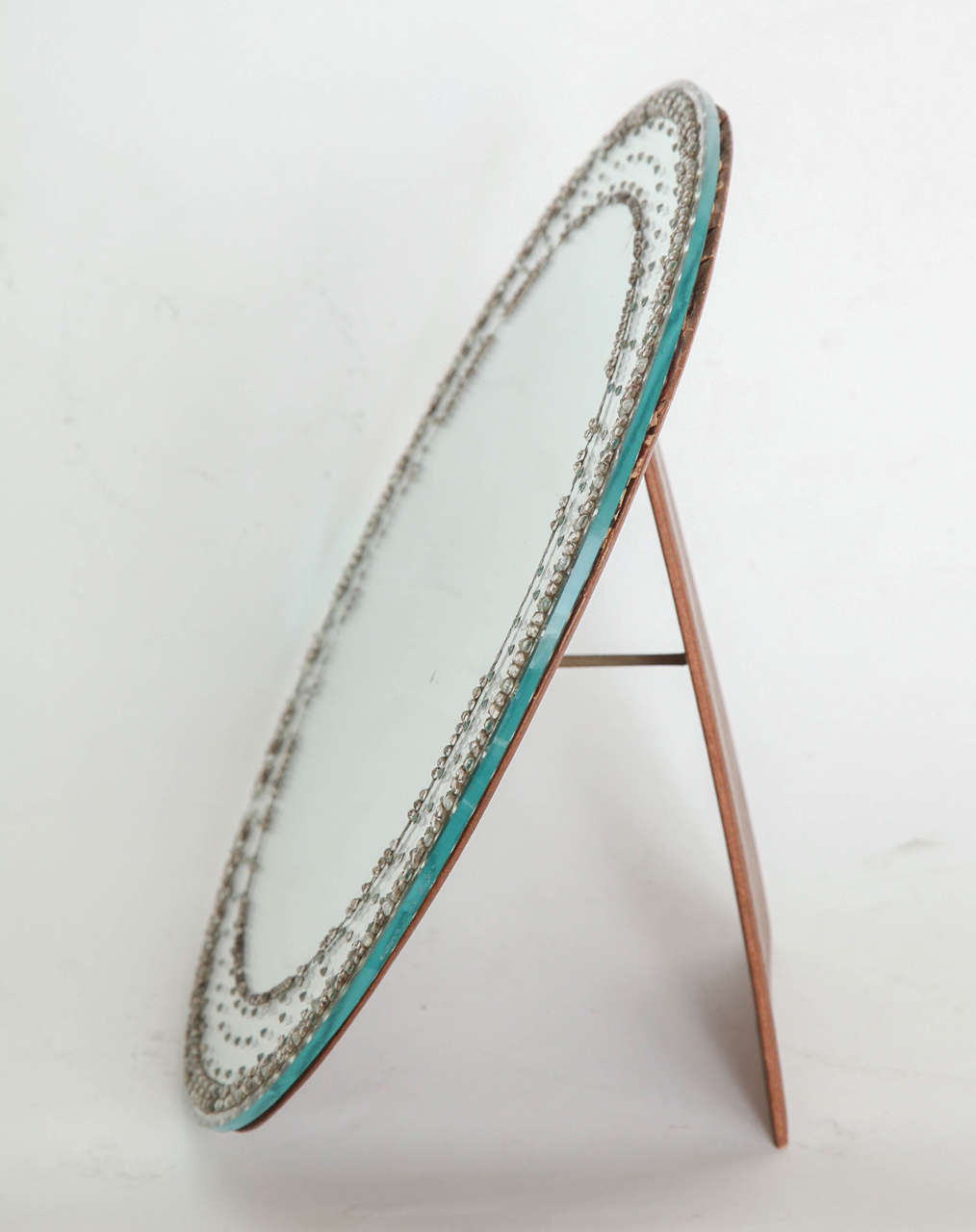A wonderful Art Deco vanity mirror with  etching and glass  encrusted bead-like decoration...a little  jewel
This is from the 1930's and has some small missing crystals.