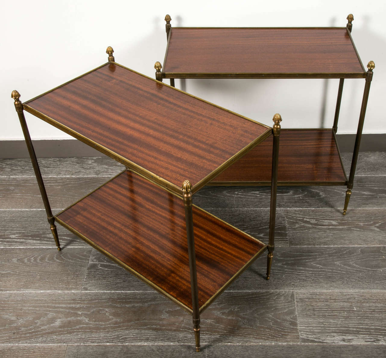 Pair of side tables, mahogany and brass,
circa 1960.
