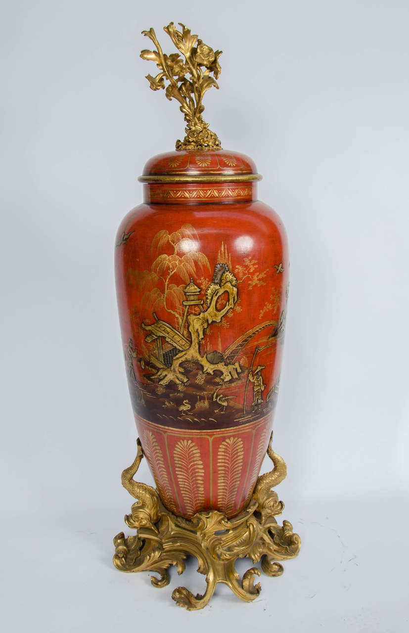 A very impressive late 19th century chinoiserie lacquer vase with ormolu mounts.