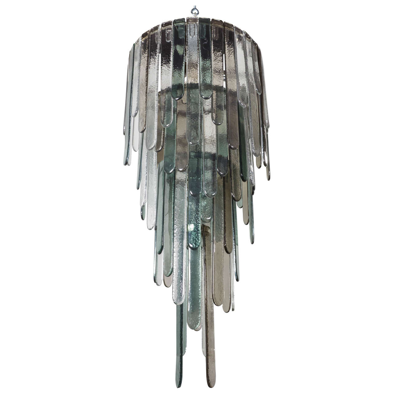 This spectacular statement fixture features over 120 handblown glass prisms in transparent hues of smoked grey, dark green and clear glass. The Murano prisms have flat design with rounded ends and a smooth organic texture. The prisms hang at varying