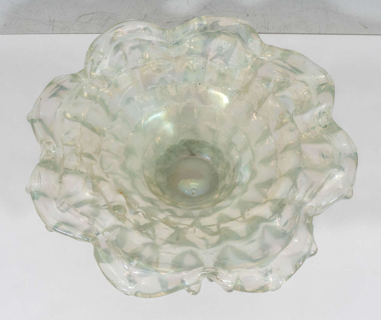 A vintage Italian, highly organic form art glass bowl, with iridescent sheen. Good vintage condition with some wear, consistent with age.