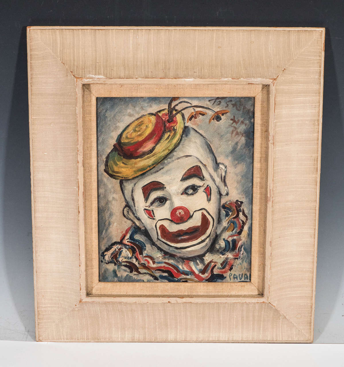 A vintage oil on canvas of a sad clown by artist Philip Kran Paval. Signed and dated 1951. 

Paval was born in Denmark. He immigrated to America in 1919. During the 1920s he moved to Los Angeles where he established a silversmith shop. Paval