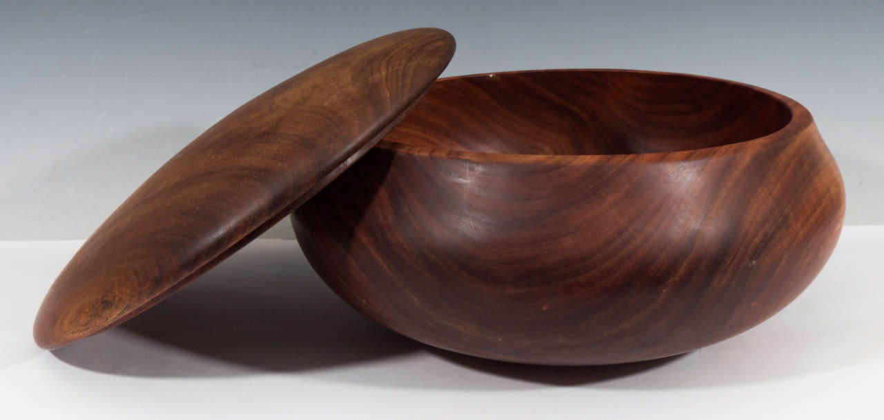 A contemporary koa wood bowl with lid, crafted in the rustic mode, attributed to artist Dan Cunningham. Signed by the artist [Cunningham 