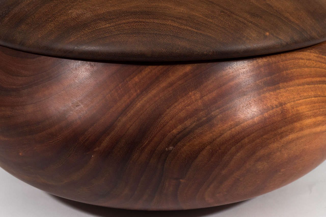 large wooden bowl with lid