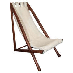 A Scandinavian Midcentury Modern Sling Chair with Sheepskin Upholstery