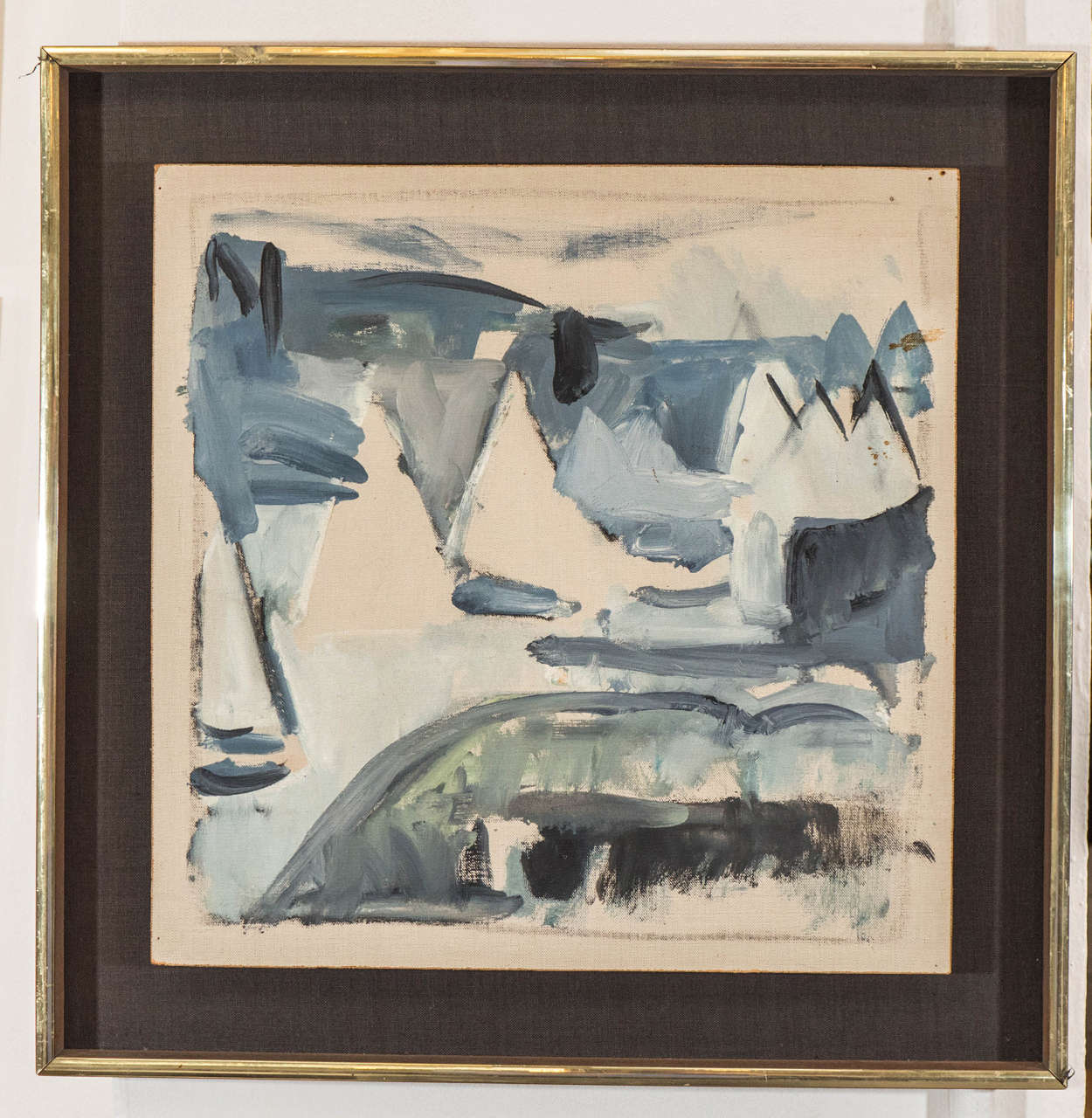 A vintage oil on board abstract painting, in shades of blue and grey, frame included, in wood with brass accents. Good vintage condition with minor scratches to surface and some age appropriate wear.