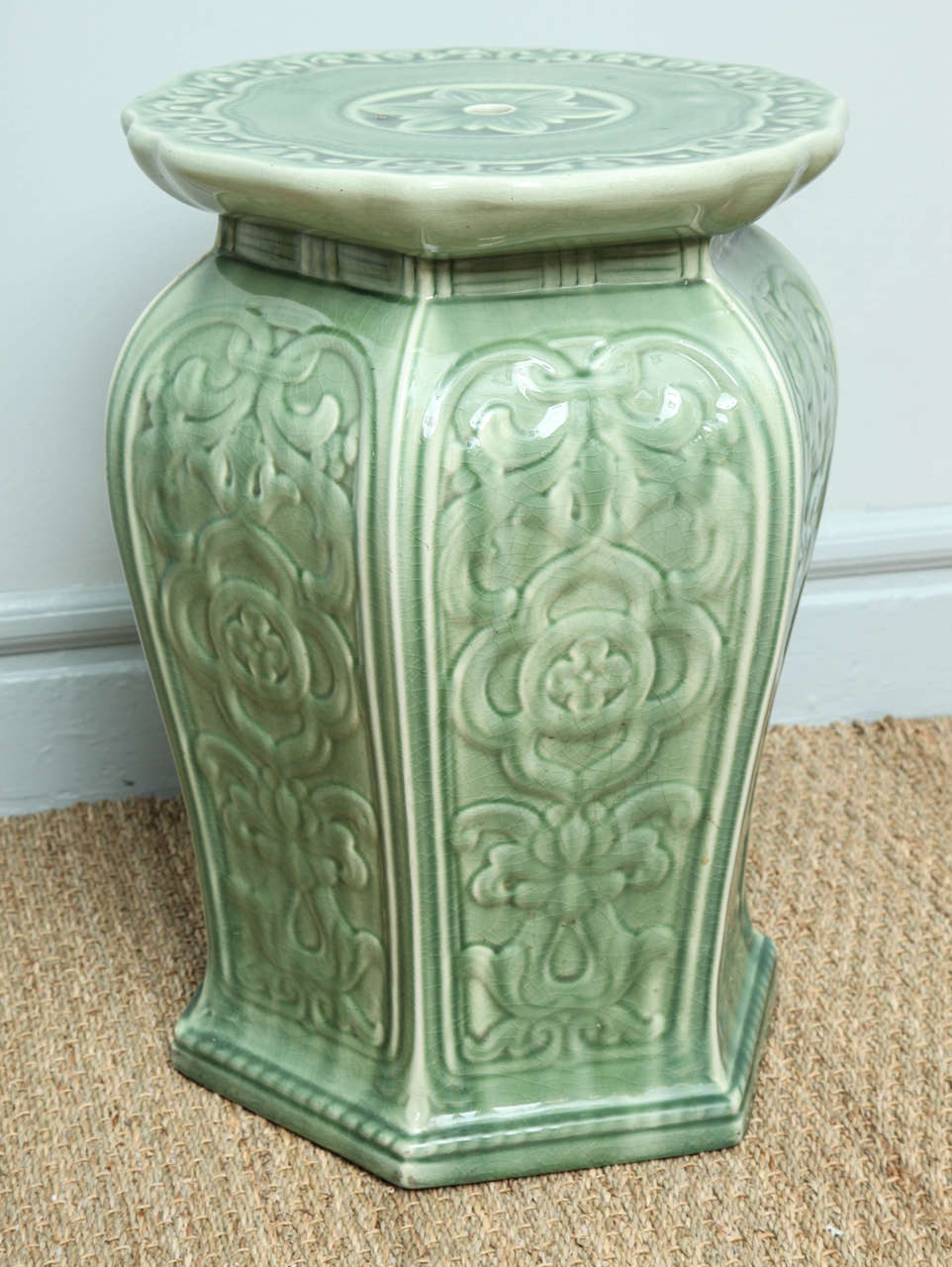 Very pretty and useful Celadon green garden seat by Minton, with stamp and registry mark to the underside, the exterior with foliate and lotus flower decoration.