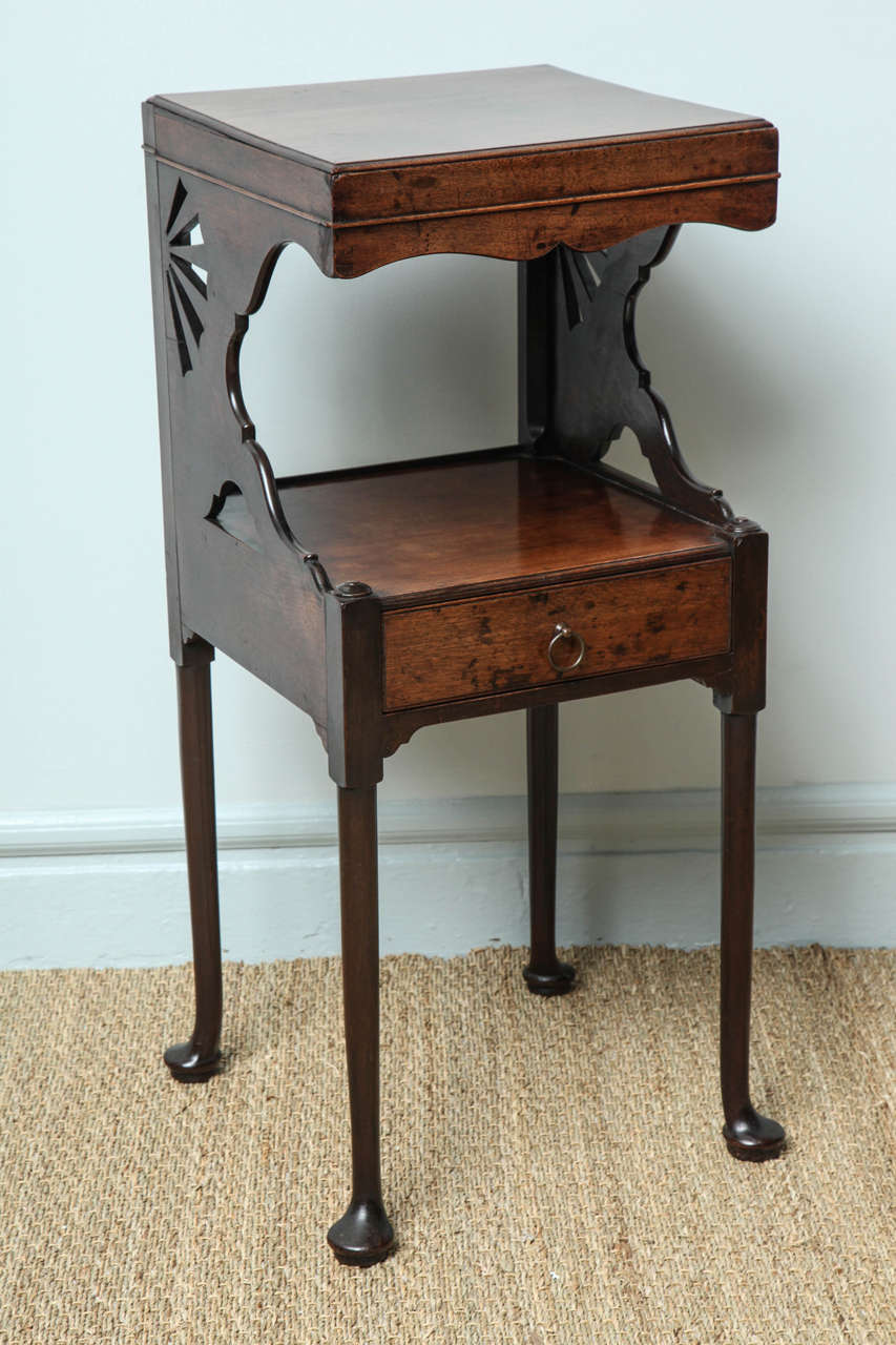 Fine and unusual early George III mahogany bedside table, the single board 