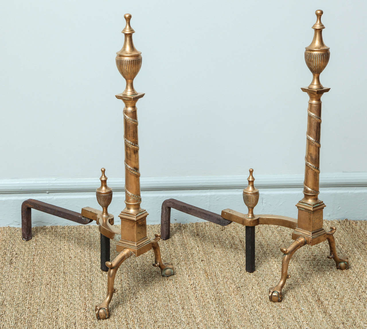 Striking Pair of Classical Andirons