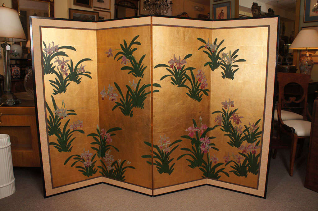 Japanese 4 panel painted screen of orchids on gold leaf back ground.