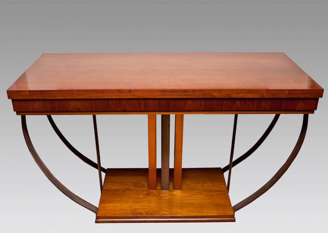 French Art Deco dining table. Measures:
54” x 22” x 31” high (closed).
54” x 44” x 31” high (open).