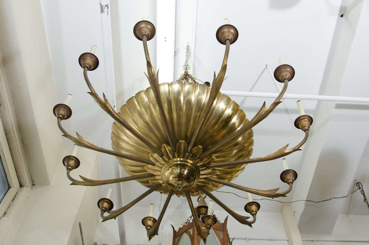 Mid-20th Century Suite of Two Hollywood Regency Solid Brass Twelve-Light Chandelier For Sale