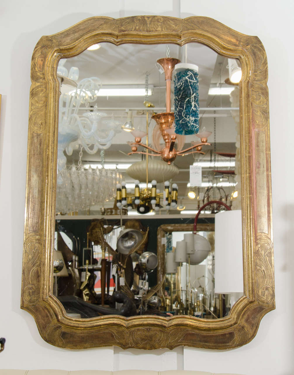 An Antique Mirror with Hand Carved Gilt Wood Frame by Max Kuehne