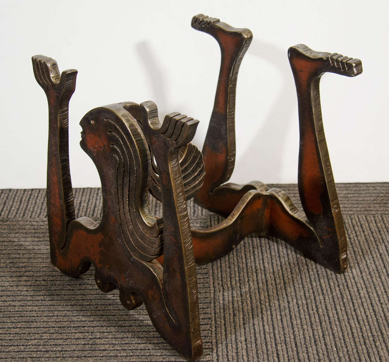 A mid century coffee or cocktail table base of a nude woman made of steel high beams.  The base is by Rochester, New York sculptor Albert Leon Wilson.   The woman's hands and feet are used to balance a 3/4