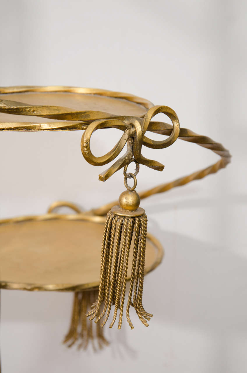 A Midcentury Spiral Plant Stand with Round Graduating Platforms at 1stDibs