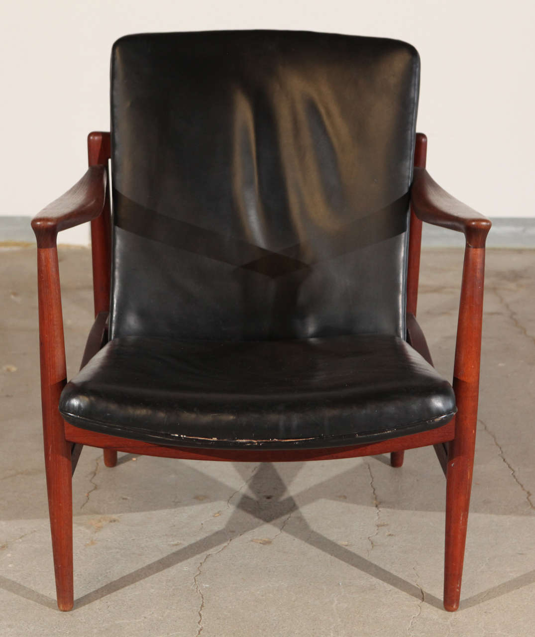 Jacob Kjaer lounge chair and ottoman with original leather.
Ottoman measures: 16.50 D x 23 W x 15.50 H.