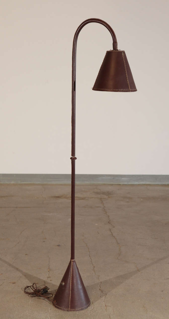 France, Jacques Adnet leather wrapped, cone shade floor lamp. 1950s.