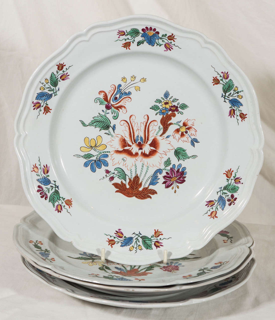 The Metropolitan Museum of Art has in their collection a pair of Doccia Ginori wine coolers in this same pattern* (see details below). This is a rare set of a dozen beautiful 18th century Italian Ginori Doccia porcelain dishes.  The dishes are true