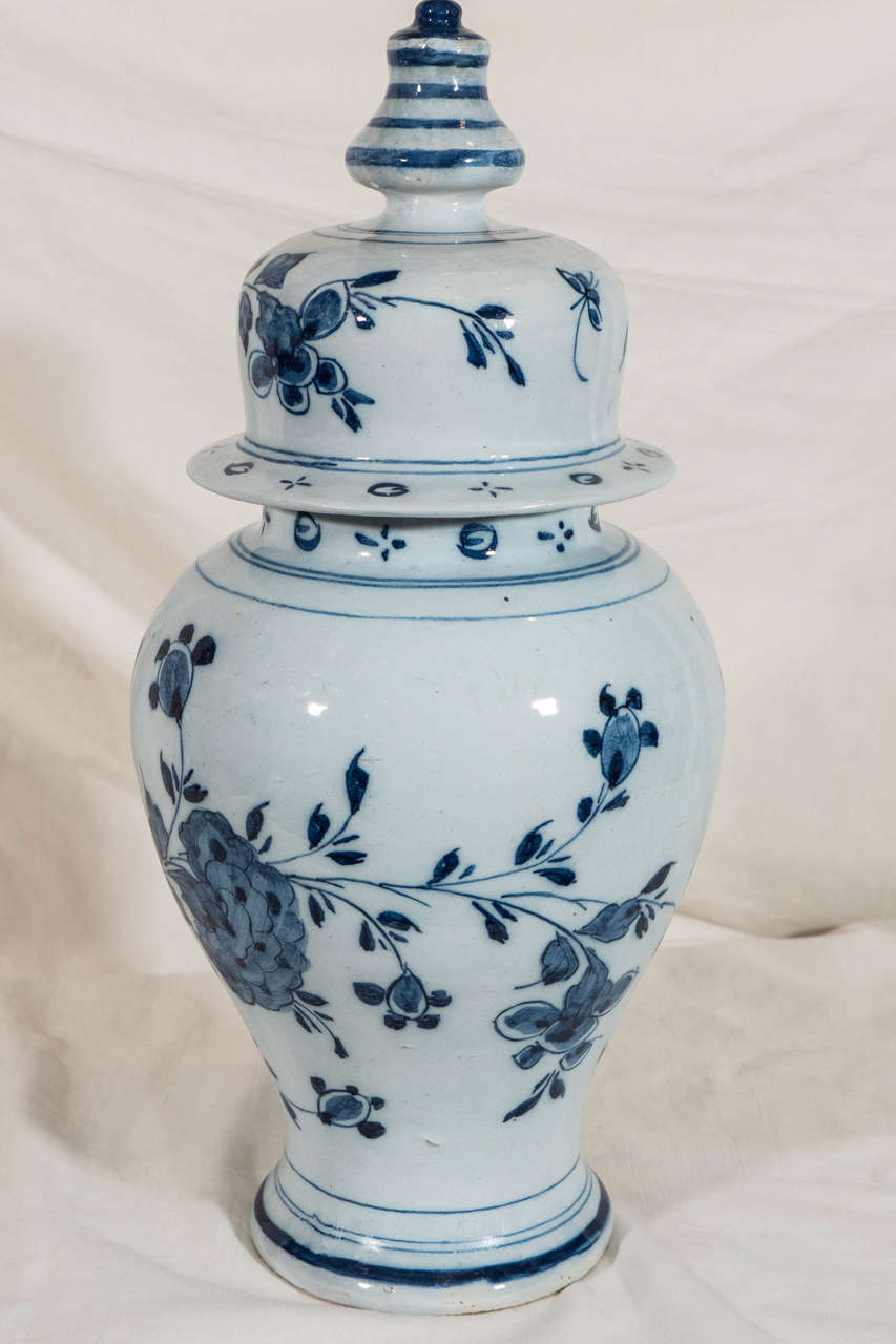 Rococo Pair of 18th Century Blue and White Dutch Delft Covered Vases
